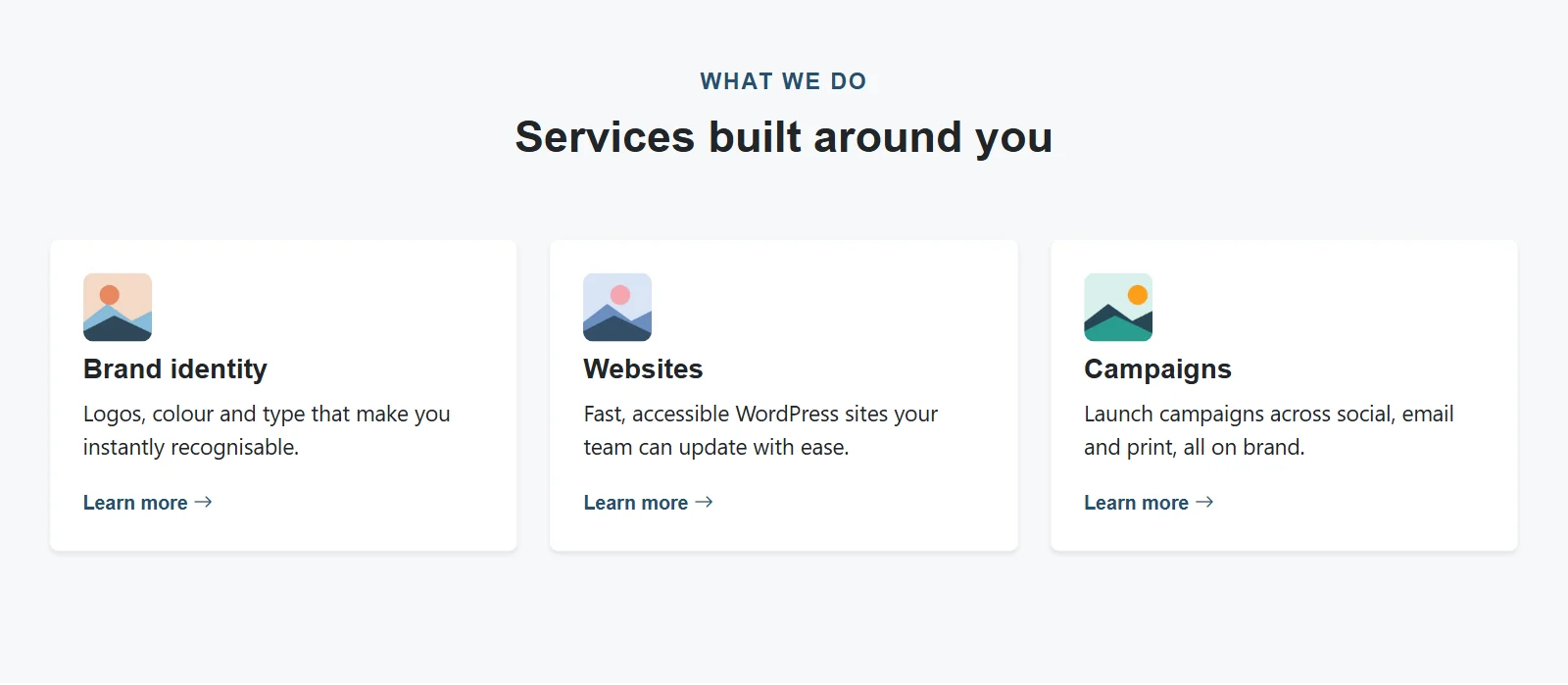 Cards block: three service cards with images, text and links